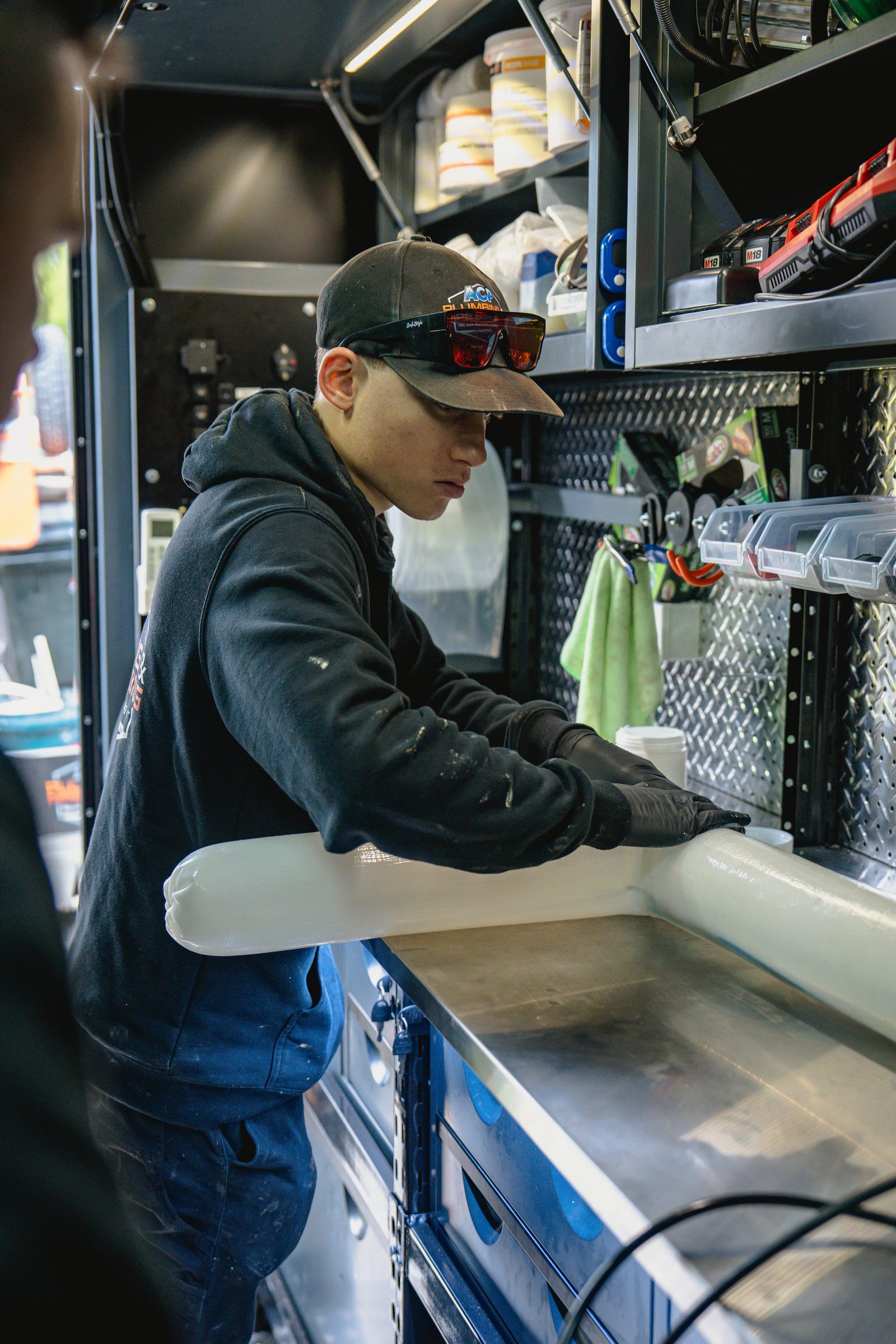 Preparing a pipe liner in the ACP service van